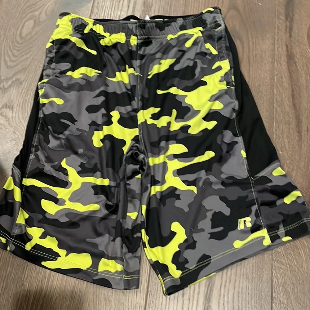 two basketball shorts both red are mediums and camp is large - Picture 3 of 4